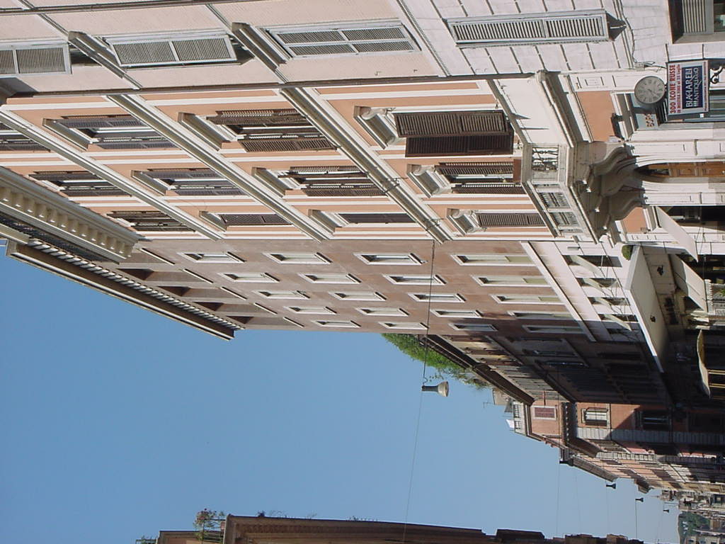 Italy-Rome-houses_lining_quiet_street.jpg