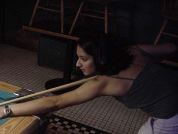 Reena-bending_over_pool_table