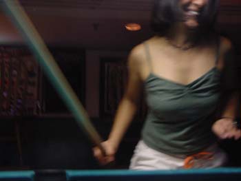 Reena-swinging_pool_stick